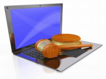 Gavel on top of laptop